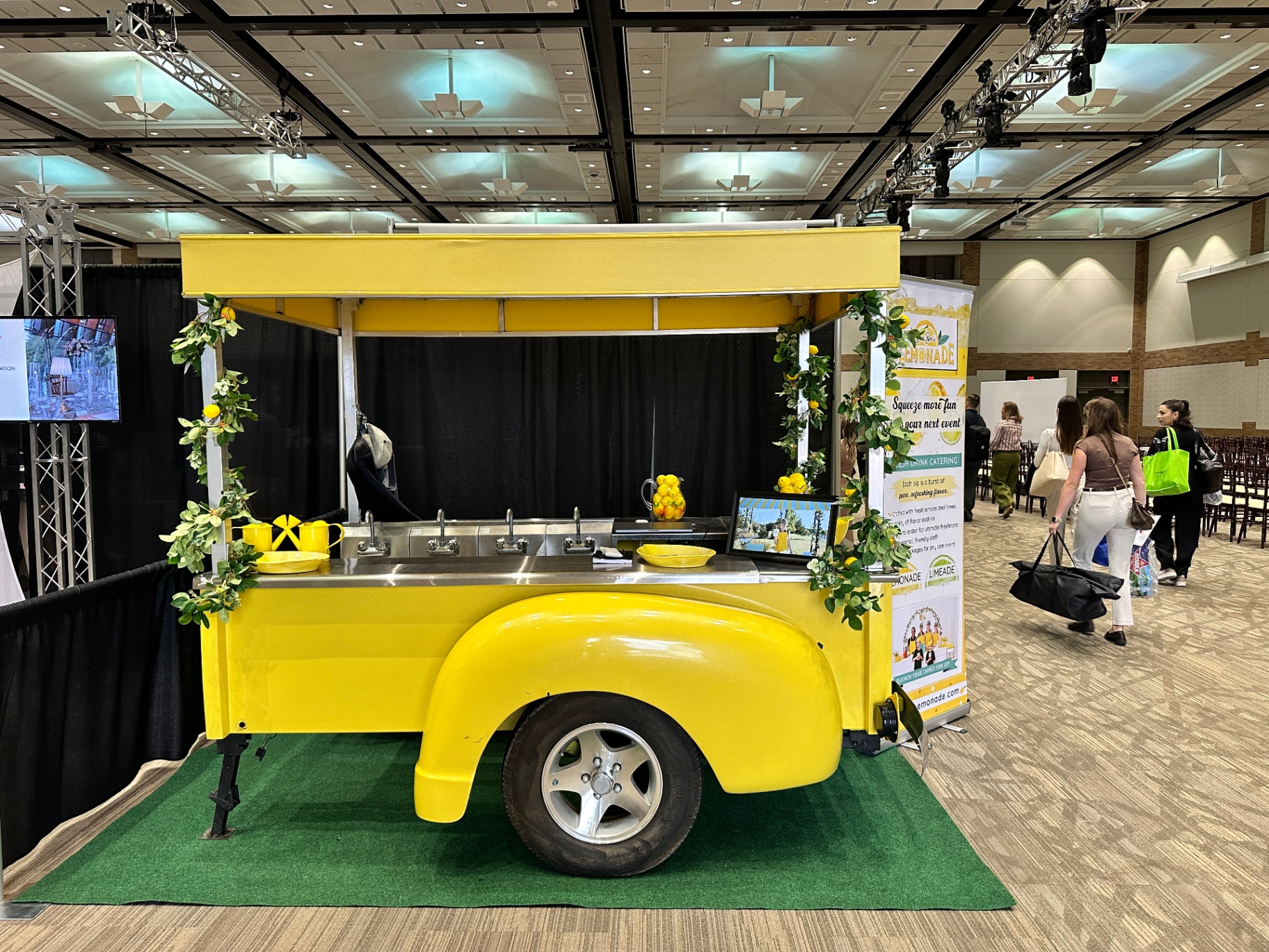 Billie Jean truck bed lemonade cart at an expo