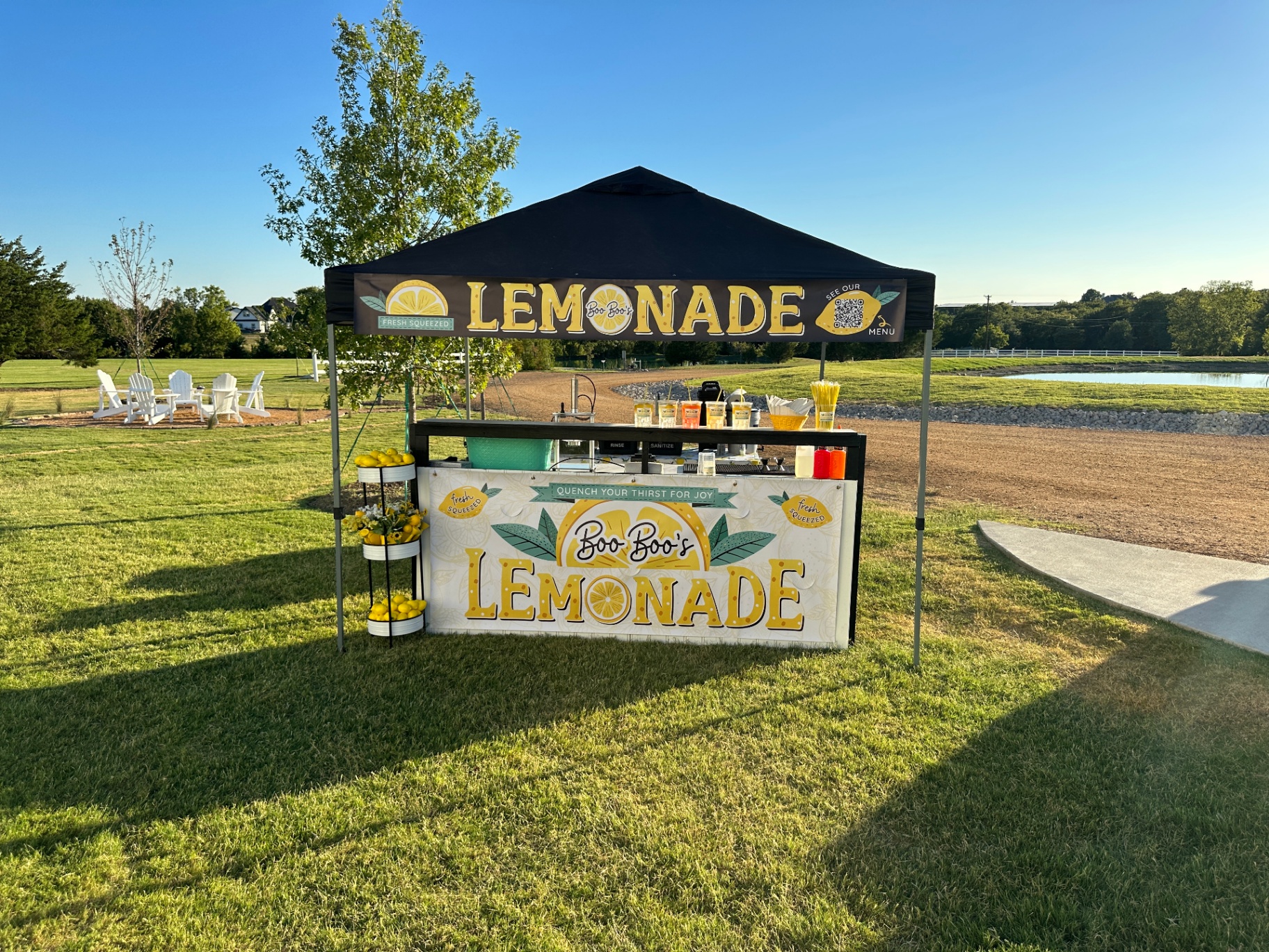 Lakeside canopy setup on a sunny afternoon