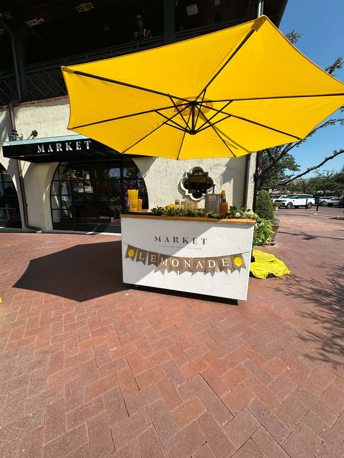 Angled view of market umbrella setup