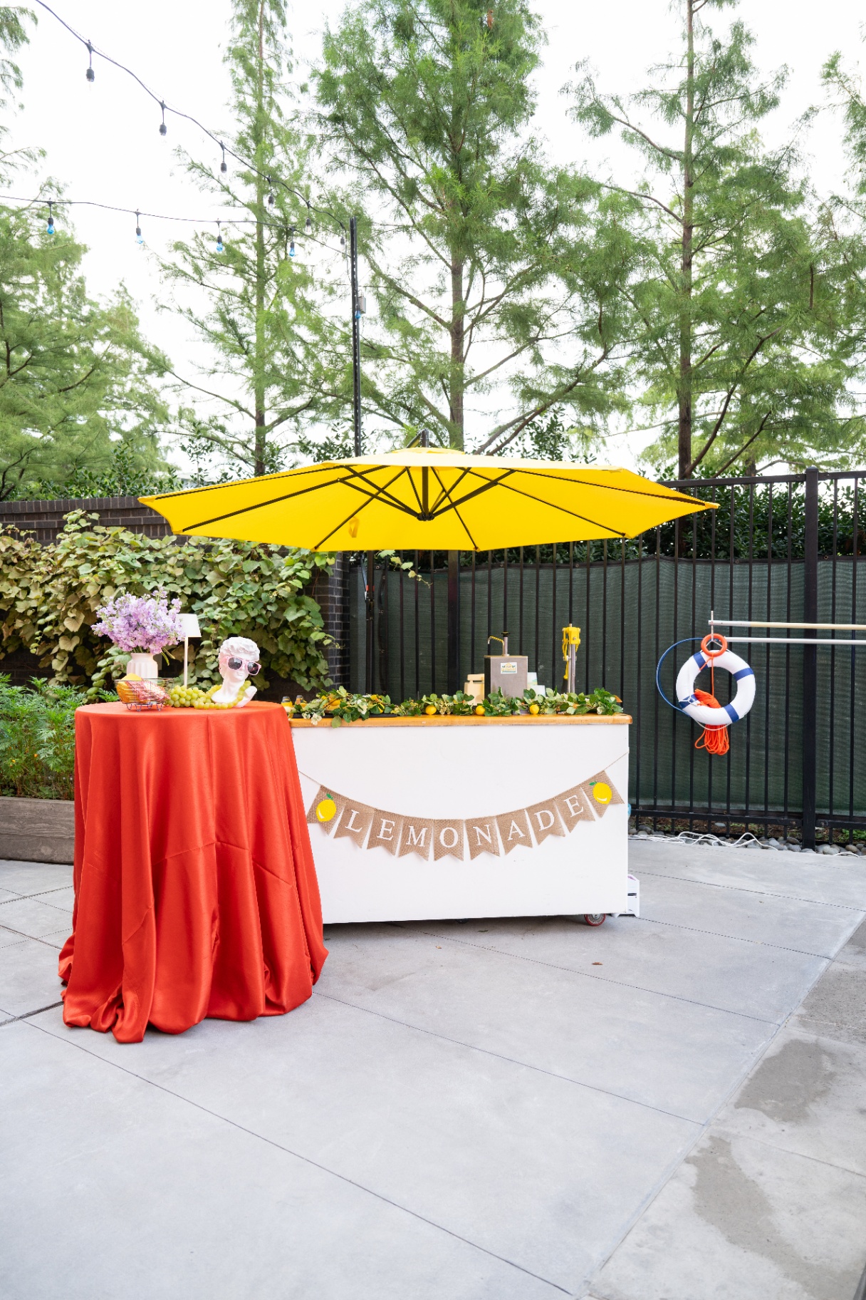 Wide view of poolside lemonade setup