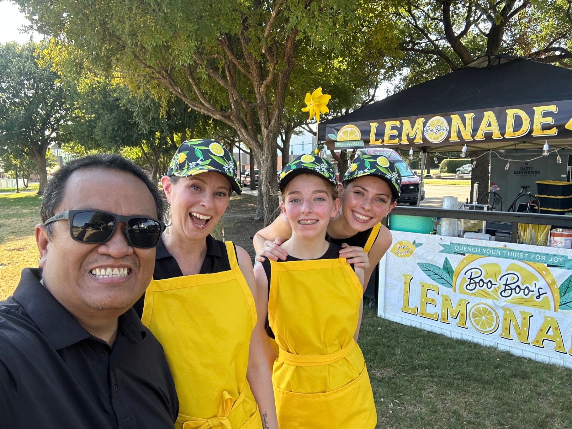 Boo Boo's team smiling in a group selfie
