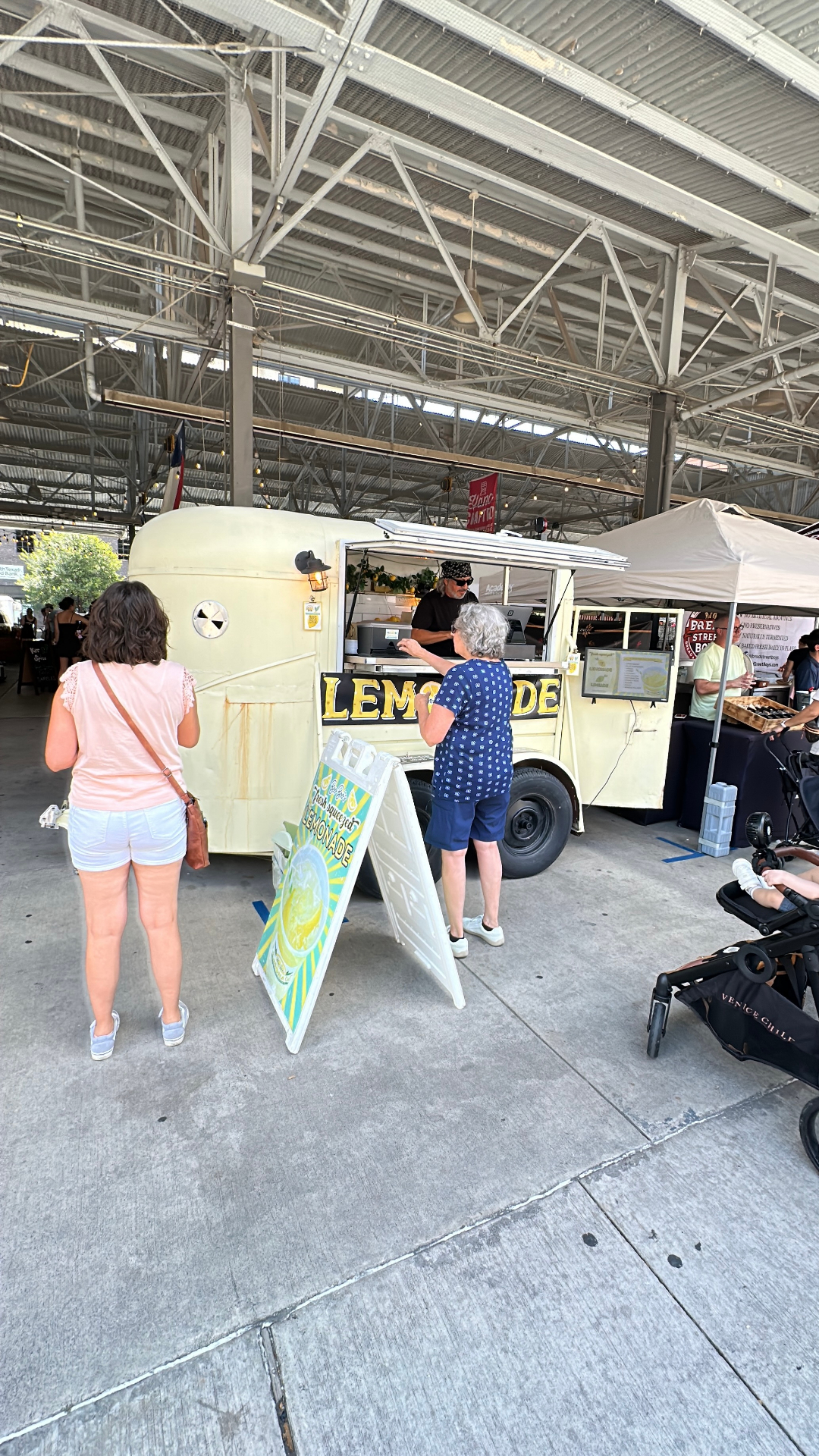 Side view of lemonade trailer in market lineup